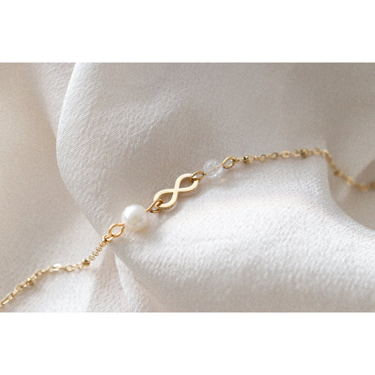 Armband Infinity & Perle – Gold