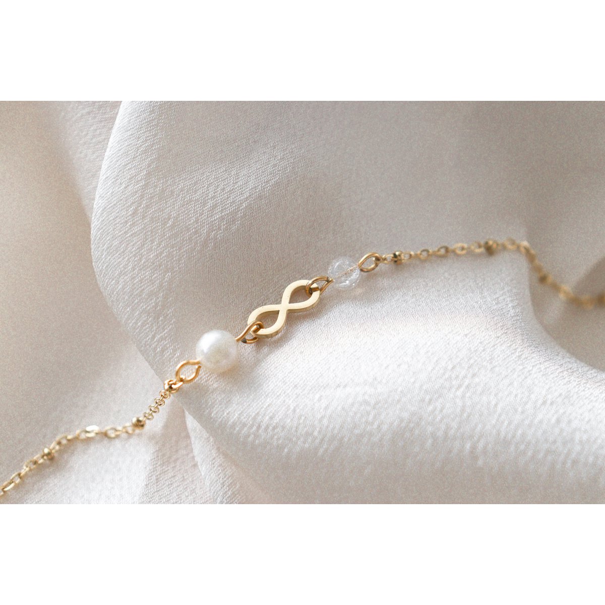 Armband Infinity & Perle – Gold